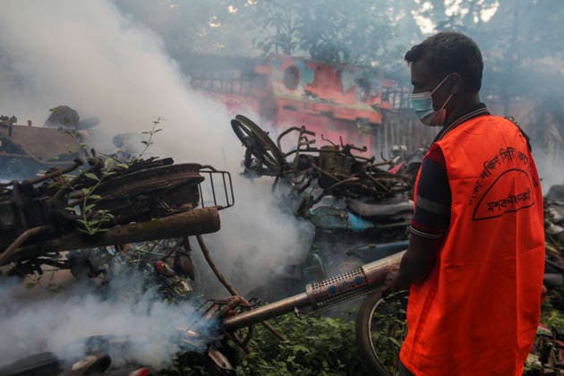 July 30, 2026, Dhaka, Dhaka, Bangladesh: A worker of the Dhaka South City Corporation sprays insecticide with a fogging machine at a dumping area in the Shahbagh police station area of Dhaka, Bangladesh, on July 30, 2026. According to the Directorate General of Health Services (DGHS), three people died from dengue and 467 patients were hospitalized with the mosquito-borne disease in the past 24 hours. Since January, the nationwide death toll has reached 53, while the total number of confirmed dengue cases has risen to 15,157. Dhaka Bangladesh - ZUMAj163 20260730_zip_j163_006 Copyright: xAbuxSufianxJewelx
