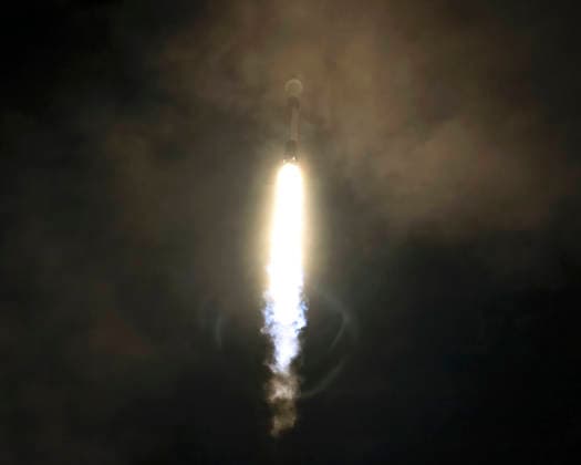 The SpaceX Falcon 9 rocket creates a shock wave as it launches through a deck of clouds on a mission carrying a classified payload at 3:10 AM from Launch Complex 40 at the Cape Canaveral Space Force Station, Florida on Wednesday July 30, 2026. The National Reconnaissance Office will manage the payload (NROL-95) as part of the National Space Security Launch Phase 2.  CCP20260730007 JOExMARINO