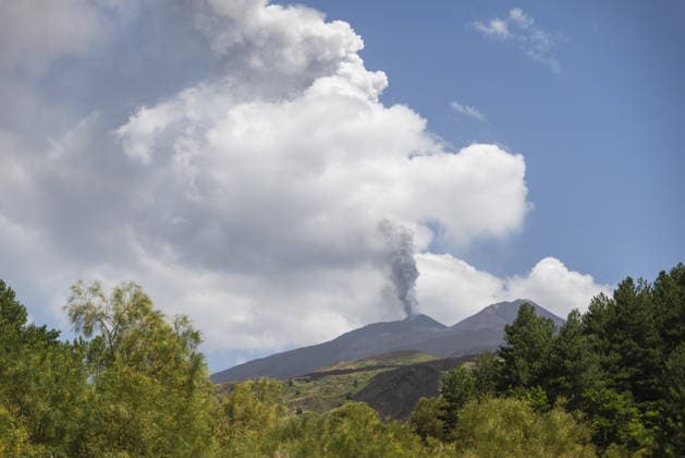 Mount Etna erupts, sending ash plume over Catania, Sicily CATANIA, ITALY - JULY 30: Mount Etna spews a column of ash after over three weeks of apparent calm on July 30, 2026 in Catania, Sicily, Italy. The activity, which began at approximately 3:30 AM local time, was characterized by intense Strombolian activity, which evolved into a lava fountain during the morning. Massive ash emission from the Voragine summit crater generated an eruption column that reached approximately 7 kilometers above sea level, dispersing west and northwest, with ashfall reported in the town of Bronte. The presence of volcanic ash prompted temporary airspace restrictions over the volcano, but operations at Catania International Airport continue regularly without in  Copyright: x2026xAnadoluxSalvatorexAllegrax