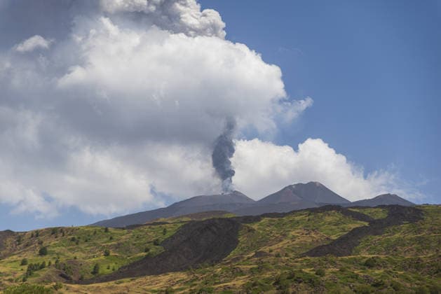 Mount Etna erupts, sending ash plume over Catania, Sicily CATANIA, ITALY - JULY 30: Mount Etna spews a column of ash after over three weeks of apparent calm on July 30, 2026 in Catania, Sicily, Italy. The activity, which began at approximately 3:30 AM local time, was characterized by intense Strombolian activity, which evolved into a lava fountain during the morning. Massive ash emission from the Voragine summit crater generated an eruption column that reached approximately 7 kilometers above sea level, dispersing west and northwest, with ashfall reported in the town of Bronte. The presence of volcanic ash prompted temporary airspace restrictions over the volcano, but operations at Catania International Airport continue regularly without in  Copyright: x2026xAnadoluxSalvatorexAllegrax