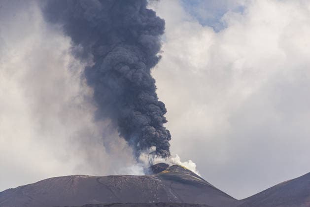 Mount Etna erupts, sending ash plume over Catania, Sicily CATANIA, ITALY - JULY 30: Mount Etna spews a column of ash after over three weeks of apparent calm on July 30, 2026 in Catania, Sicily, Italy. The activity, which began at approximately 3:30 AM local time, was characterized by intense Strombolian activity, which evolved into a lava fountain during the morning. Massive ash emission from the Voragine summit crater generated an eruption column that reached approximately 7 kilometers above sea level, dispersing west and northwest, with ashfall reported in the town of Bronte. The presence of volcanic ash prompted temporary airspace restrictions over the volcano, but operations at Catania International Airport continue regularly without in  Copyright: x2026xAnadoluxSalvatorexAllegrax