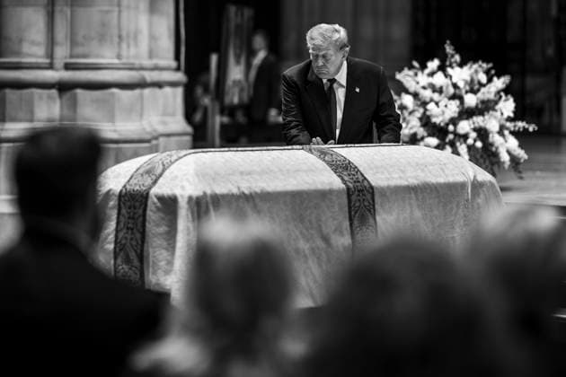 July 30, 2026, Washington, Dc, United States: U.S. President Donald Trump, pauses for a moment at the casket of former Senator Lindsey Graham, R-SC, during the memorial service at Washington National Cathedral, July 28, 2026, in Washington, D.C. Washington United States - ZUMAp138 20260730_zaa_p138_013 Copyright: xDanielxTorok WhitexHousex