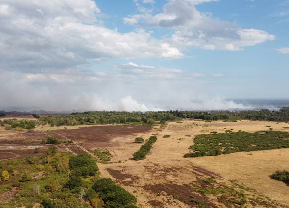Heath fire breaks out in United Kingdom LEISTON, UNITED KINGDOM - JULY 30: Smoke rises around the area where firefighters responded to a large wildfire and heath fire at Dunwich Heath near Suffolk in Leiston, United Kingdom, on July 30, 2026. A major incident was declared after the blaze spread across approximately 100 hectares, prompting the evacuation of nearby areas. Rasid Necati Aslim Anadolu Leiston United Kingdom. Editorial use only. Please get in touch for any other usage.  Copyright: x2026xAnadoluxRasidxNecatixAslimx