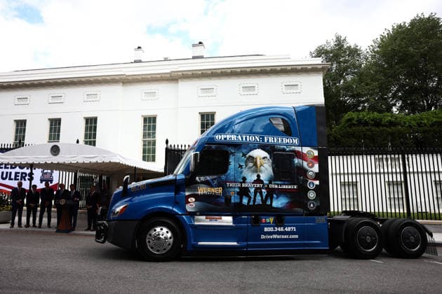 The cab of a semitruck is parked outside the West Wing of the White House as President Donald Trump announces a program to allow veterans to expedite a career in commercial trucking in Washington, DC, on Thursday July 30, 2026. Known as the Freedom Haulers program, the initiative would allow any US veterans who drove heavy equipment to be automatically eligible for a commercial trucking license.  WASP20260730103 JIMxLOxSCALZO