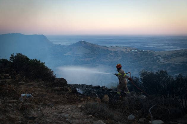 Forest fire in the Greek island of Crete CRETE, GREECE - JULY 30: Firefighters continue their efforts to extinguish the wildfire near the village of Agia Paraskevi, in Rethymno, on the island of Crete, Greece, on July 30, 2026. Costas Baltas Anadolu Crete Greece. Editorial use only. Please get in touch for any other usage.  Copyright: x2026xAnadoluxCostasxBaltasx