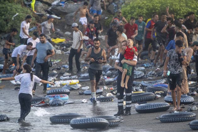 Hundreds of migrants reach Spain s Ceuta after swimming from Morocco CEUTA, SPAIN - JULY 30: Hundreds of migrants have attempted to swim from Morocco to the Spanish city of Ceuta in North Africa, while the number of arrivals exceeded 1,500 in just over a week, according to local news in Cueta, Spain on July 30, 2026. As Moroccan and Algerian migrants attempted to reach Ceuta by swimming, most were reportedly intercepted by Moroccan patrol boats. Spain s Maritime Rescue Service and the Spanish Red Cross rescued 117 people from the water, while the Civil Guard assisted around 200 others with patrol boats. The Spanish Civil Guard also found two bodies which raised the death toll along Ceuta s coastline so far this year to 29. Marcos Moreno A  Copyright: x2026xAnadoluxMarcosxMorenox