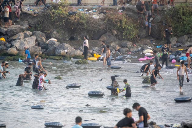Hundreds of People Swim to Ceuta from Morocco Several people arrive in Spain from Morocco on July 30, 2026, in Ceuta, Spain Hundreds of people of Maghreb origin have crossed into Ceuta from Morocco throughout the day today, by swimming and along the breakwater. Over the past week, more than 2,000 migrants have already done so. JULY 30, 2026 MIGRATION MIGRANTS Ceuta Ceuta, Spain  Copyright: xMarcosxMorenox 7696136