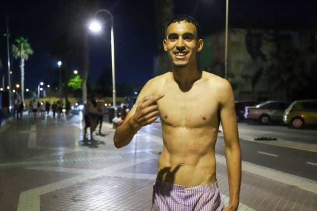 July 30, 2026, Melilla, Spain: MELILLA, Spain Ã¢â‚¬ July 31, 2026: Spanish security forces respond to a large-scale migrant crossing attempt along Melilla s border with Morocco after hundreds of migrants tried to enter the Spanish enclave through the Dique Sur, Barrio Chino, and the Beni-Enzar and Farhana border crossings. Authorities also reported attempted breaches of the border fence at Barrio Chino and Beni-Enzar, where riot-control measures were deployed. According to preliminary estimates, around 400 migrants reached Melilla by land and sea, while the Beni-Enzar border crossing was closed until further notice. The incident comes amid increased migratory pressure affecting the Spanish enclaves of Melilla and Ceuta. Melilla Spain  - ZUMAq101 20260730_zna_q101_109 Copyright: xMohaxBelkasenx