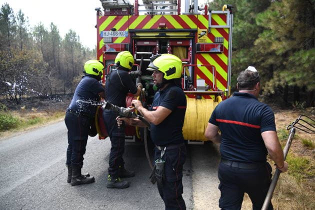France continues wildfire battle as heat wave keeps Europe on alert BORDEAUX, FRANCE - JULY 30: Firefighters inspect and secure a wildfire-affected forest near Bordeaux, France, on July 30, 2026, as they continue operations to extinguish flare-ups and prevent the fire from reigniting. Fire crews remain deployed following the evacuation of nearby campsites and the closure of beaches due to the wildfire threat. Dragan Lekic Anadolu Bordeaux France. Editorial use only. Please get in touch for any other usage.  Copyright: x2026xAnadoluxDraganxLekicx