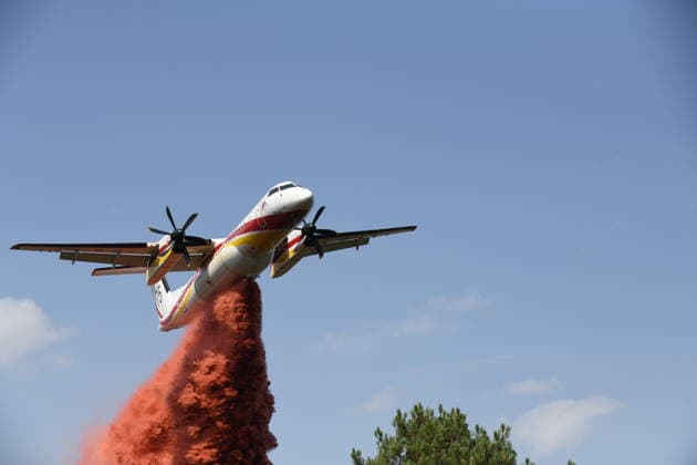 France continues wildfire battle as heat wave keeps Europe on alert BORDEAUX, FRANCE - JULY 30: A firefighting aircraft drops fire retardant over a forest near Bordeaux, France, on July 30, 2026, as crews continue efforts to contain a wildfire. Firefighters remain engaged in battling flare-ups following the evacuation of nearby campsites and the closure of beaches due to the wildfire threat. Dragan Lekic Anadolu Bordeaux France. Editorial use only. Please get in touch for any other usage.  Copyright: x2026xAnadoluxDraganxLekicx