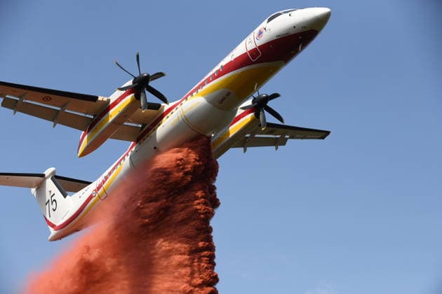 France continues wildfire battle as heat wave keeps Europe on alert BORDEAUX, FRANCE - JULY 30: A firefighting aircraft drops fire retardant over a forest near Bordeaux, France, on July 30, 2026, as crews continue efforts to contain a wildfire. Firefighters remain engaged in battling flare-ups following the evacuation of nearby campsites and the closure of beaches due to the wildfire threat. Dragan Lekic Anadolu Bordeaux France. Editorial use only. Please get in touch for any other usage.  Copyright: x2026xAnadoluxDraganxLekicx
