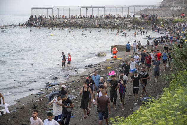 Hundreds of migrants reach Spain s Ceuta after swimming from Morocco CEUTA, SPAIN - JULY 30: Hundreds of migrants have attempted to swim from Morocco to the Spanish city of Ceuta in North Africa, while the number of arrivals exceeded 1,500 in just over a week, according to local news in Cueta, Spain on July 30, 2026. As Moroccan and Algerian migrants attempted to reach Ceuta by swimming, most were reportedly intercepted by Moroccan patrol boats. Spain s Maritime Rescue Service and the Spanish Red Cross rescued 117 people from the water, while the Civil Guard assisted around 200 others with patrol boats. The Spanish Civil Guard also found two bodies which raised the death toll along Ceuta s coastline so far this year to 29. Marcos Moreno A  Copyright: x2026xAnadoluxMarcosxMorenox