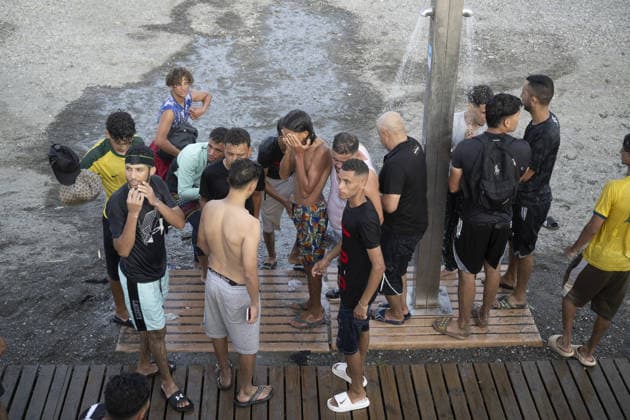 Hundreds of migrants reach Spain s Ceuta after swimming from Morocco CEUTA, SPAIN - JULY 30: Hundreds of migrants have attempted to swim from Morocco to the Spanish city of Ceuta in North Africa, while the number of arrivals exceeded 1,500 in just over a week, according to local news in Cueta, Spain on July 30, 2026. As Moroccan and Algerian migrants attempted to reach Ceuta by swimming, most were reportedly intercepted by Moroccan patrol boats. Spain s Maritime Rescue Service and the Spanish Red Cross rescued 117 people from the water, while the Civil Guard assisted around 200 others with patrol boats. The Spanish Civil Guard also found two bodies which raised the death toll along Ceuta s coastline so far this year to 29. Marcos Moreno A  Copyright: x2026xAnadoluxMarcosxMorenox