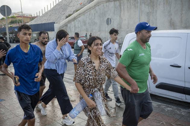 Hundreds of migrants reach Spain s Ceuta after swimming from Morocco CEUTA, SPAIN - JULY 30: Hundreds of migrants have attempted to swim from Morocco to the Spanish city of Ceuta in North Africa, while the number of arrivals exceeded 1,500 in just over a week, according to local news in Cueta, Spain on July 30, 2026. As Moroccan and Algerian migrants attempted to reach Ceuta by swimming, most were reportedly intercepted by Moroccan patrol boats. Spain s Maritime Rescue Service and the Spanish Red Cross rescued 117 people from the water, while the Civil Guard assisted around 200 others with patrol boats. The Spanish Civil Guard also found two bodies which raised the death toll along Ceuta s coastline so far this year to 29. Marcos Moreno A  Copyright: x2026xAnadoluxMarcosxMorenox