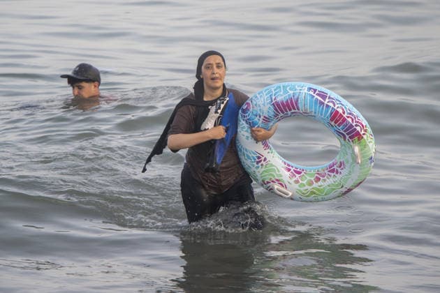 Hundreds of migrants reach Spain s Ceuta after swimming from Morocco CEUTA, SPAIN - JULY 30: Hundreds of migrants have attempted to swim from Morocco to the Spanish city of Ceuta in North Africa, while the number of arrivals exceeded 1,500 in just over a week, according to local news in Cueta, Spain on July 30, 2026. As Moroccan and Algerian migrants attempted to reach Ceuta by swimming, most were reportedly intercepted by Moroccan patrol boats. Spain s Maritime Rescue Service and the Spanish Red Cross rescued 117 people from the water, while the Civil Guard assisted around 200 others with patrol boats. The Spanish Civil Guard also found two bodies which raised the death toll along Ceuta s coastline so far this year to 29. Marcos Moreno A  Copyright: x2026xAnadoluxMarcosxMorenox