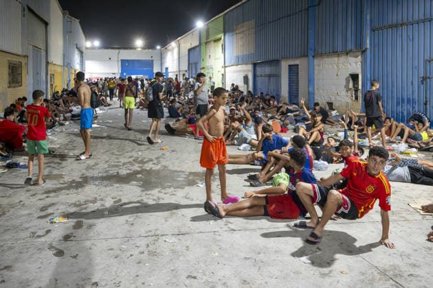 Hundreds of migrants reach Spain s Ceuta after swimming from Morocco CEUTA, SPAIN - JULY 30: Hundreds of migrants have attempted to swim from Morocco to the Spanish city of Ceuta in North Africa, while the number of arrivals exceeded 1,500 in just over a week, according to local news in Cueta, Spain on July 30, 2026. As Moroccan and Algerian migrants attempted to reach Ceuta by swimming, most were reportedly intercepted by Moroccan patrol boats. Spain s Maritime Rescue Service and the Spanish Red Cross rescued 117 people from the water, while the Civil Guard assisted around 200 others with patrol boats. The Spanish Civil Guard also found two bodies which raised the death toll along Ceuta s coastline so far this year to 29. Marcos Moreno A  Copyright: x2026xAnadoluxMarcosxMorenox