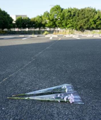 Aftermath of strong earthquake in Kumamoto Flowers are placed in a parking lot at the Aeon Mall Kumamoto shopping center in Kashima, Kumamoto Prefecture, on July 31, 2026, three days after a deadly explosion following a powerful earthquake that hit the southwestern Japan prefecture and its vicinity.  A14AA0005624657P