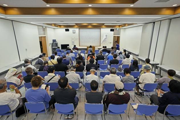 Aftermath of strong earthquake in Kumamoto Citizens wait to apply for a document certifying damage done to their property at the Uki city government office in Uki, Kumamoto Prefecture, on July 31, 2026, three days after a powerful earthquake struck the southwestern Japan prefecture. The certificate is required to receive such support as temporary housing and tax reduction or exemption.  A14AA0005624682P