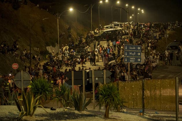 Moroccan forces block migrants from reaching Ceuta near Fnideq FNIDEQ, MOROCCO - JULY 30: Moroccan security forces deploy near the northern city of Fnideq as thousands of irregular migrants attempt to reach Ceuta, Spain s territory in North Africa, on July 30, 2026 in Fnideq, Morocco. Security forces prevented the migrants from crossing during the night between Thursday and Friday. Some migrants were detained and transported outside the city, while security operations continued across the area. Hicham Rachidi Anadolu Fnideq Morocco. Editorial use only. Please get in touch for any other usage.  Copyright: x2026xAnadoluxHichamxRachidix