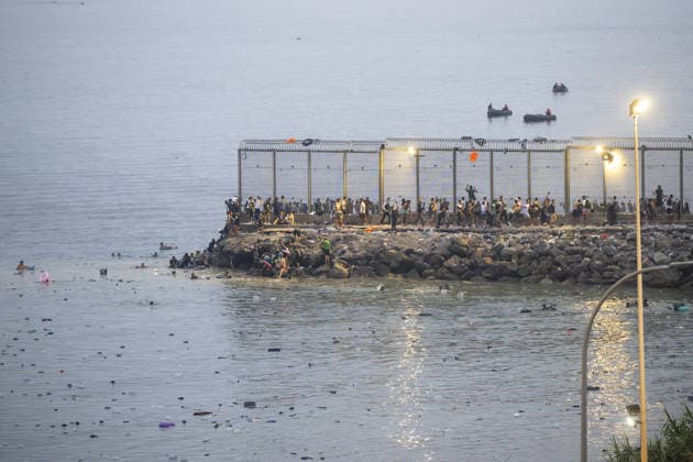 Migrants arrive on shore after attempting sea crossing to Ceuta from Morocco CEUTA, SPAIN - JULY 31: Migrants arrive on the shore of the Spanish city of Ceuta in North Africa after attempting to swim from Morocco on July 31, 2026. Moroccan and Algerian migrants attempted to reach Ceuta by sea, while many were intercepted by Moroccan patrol boats. Spain s Maritime Rescue Service, the Spanish Red Cross, and the Civil Guard carried out rescue operations after the attempted crossings. Marcos Moreno Anadolu Ceuta Spain. Editorial use only. Please get in touch for any other usage.  Copyright: x2026xAnadoluxMarcosxMorenox