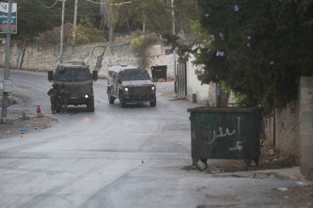 Palestinian-Israeli conflict - 31 Jul 2026 Israeli military vehicles withdrew after an Israeli army operation in the village of Salem, east of Nablus in the West Bank. The operation included raids and searches of Palestinian homes, resulting in the arrest of two brothers and a third person, following a heavy deployment of forces throughout the village. Nablus Palestine Copyright: xNasserxIshtayehx xSOPAxImagesx Nishtayeh237