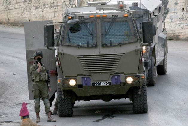 Palestinian-Israeli conflict - 31 Jul 2026 Israeli soldiers closed the main road in the village of Salem, east of Nablus in the West Bank, during the military operation, which included raids and searches of Palestinian homes, resulting in the arrest of two brothers and a third person, following a heavy deployment of forces throughout the village. Nablus Palestine Copyright: xNasserxIshtayehx xSOPAxImagesx Nishtayeh243