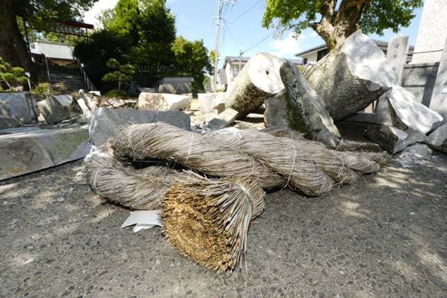 Aftermath of strong earthquake in Kumamoto A torii gateway is seen collapsed at a shrine in Uki in Kumamoto Prefecture, southwestern Japan, on July 31, 2026, three days after a powerful earthquake hit the region.  A14AA0005624723P
