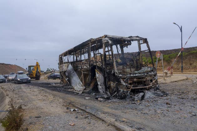 Moroccan forces block irregular migrants attempting to reach Ceuta FNIDEQ, MOROCCO - JULY 31: A burned-out bus and other damaged vehicles remain on a road near the border with Ceuta following clashes between Moroccan security forces and irregular migrants, on July 31, 2026 in Fnideq, Morocco. Authorities blocked roads across the northern city and deployed additional security measures to prevent migrants from reaching Ceuta, the Spanish-administered territory in North Africa. Hicham Rachidi Anadolu Fnideq Fas. Editorial use only. Please get in touch for any other usage.  Copyright: x2026xAnadoluxHichamxRachidix