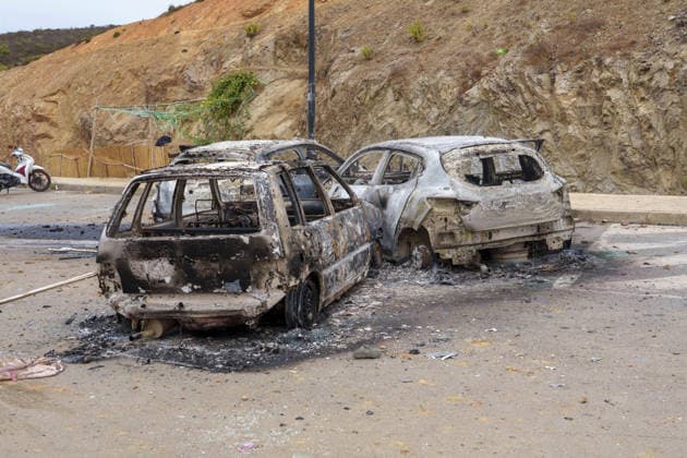 Moroccan forces block irregular migrants attempting to reach Ceuta FNIDEQ, MOROCCO - JULY 31: Burned-out vehicles remain on a road near the border with Ceuta following clashes between Moroccan security forces and irregular migrants, on July 31, 2026 in Fnideq, Morocco. Authorities blocked roads across the northern city and deployed additional security measures to prevent migrants from reaching Ceuta, the Spanish-administered territory in North Africa. Hicham Rachidi Anadolu Fnideq Fas. Editorial use only. Please get in touch for any other usage.  Copyright: x2026xAnadoluxHichamxRachidix