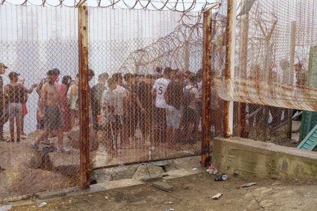 Moroccan forces block irregular migrants attempting to reach Ceuta FNIDEQ, MOROCCO - JULY 31: Irregular migrants move along a security fence topped with razor wire near the border with Ceuta as they attempt to reach the Spanish-administered territory, on July 31, 2026 in Fnideq, Morocco. Authorities blocked roads across the northern city and deployed additional security measures to prevent migrants from reaching Ceuta, the Spanish-administered territory in North Africa. Hicham Rachidi Anadolu Fnideq Fas. Editorial use only. Please get in touch for any other usage.  Copyright: x2026xAnadoluxHichamxRachidix