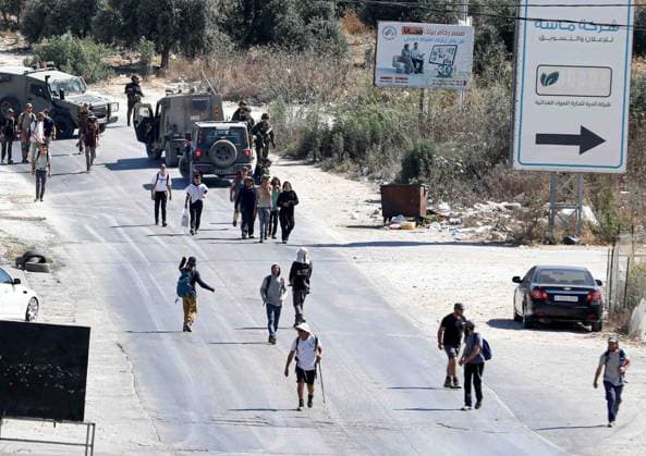 July 31, 2026, Sarra, West Bank, Palestine: Nablus, Palestine. July 31, 2026. The area southwest of Nablus has witnessed a dangerous escalation since Saturday morning, as hundreds of Israeli settlers carried out widespread attacks on Palestinian villages...A march of Israeli settlers, under heavy protection from Israeli army forces, advanced toward the outskirts of the village of Sarra, where settlers set fire to and vandalized Palestinian homes and other properties...The attacks later spread to the nearby village of Burin, where settlers burned olive trees and damaged properties belonging to Palestinian residents Sarra Palestine - ZUMAd99_ 20260731_zap_d99_007 Copyright: xMohammedxTurabix