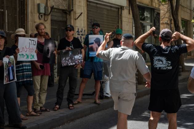 Protesters Demand Justice for Palestinian Activist Odeh Hadalin in Jerusalem JERUSALEM, Israel July 31, 2026: Demonstrators gather outside the Jerusalem District Attorney™s Office to commemorate Palestinian activist and teacher Odeh Hadalin, who was killed last year in Umm al-Khair, South Hebron Hills. Organized by several left-wing groups, the protest called for those responsible for his killing to be brought to justice and denounced ongoing settler violence against Palestinians in the occupied West Bank. During the demonstration, several passersby confronted protesters and seized some of their signs. Jerusalem Israel Copyright: x xjessxflomx xJNAxPressx