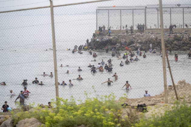 Hundreds of migrants reach Spain s Ceuta after swimming from Morocco CEUTA, SPAIN - JULY 31: Hundreds of migrants attempt to swim from Morocco to the Spanish city of Ceuta in North Africa, while the number of arrivals exceeded 1,500 in just over a week, according to local news, in Ceuta, Spain on July 31, 2026. Marcos Moreno Anadolu Ceuta Spain. Editorial use only. Please get in touch for any other usage.  Copyright: x2026xAnadoluxMarcosxMorenox