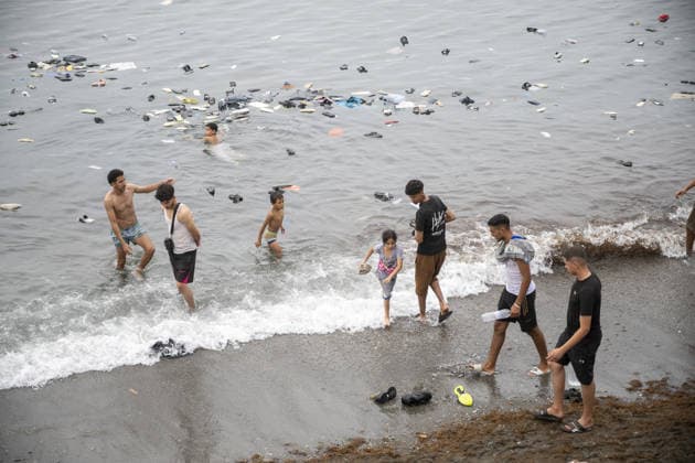 Hundreds of migrants reach Spain s Ceuta after swimming from Morocco CEUTA, SPAIN - JULY 31: Hundreds of migrants attempt to swim from Morocco to the Spanish city of Ceuta in North Africa, while the number of arrivals exceeded 1,500 in just over a week, according to local news, in Ceuta, Spain on July 31, 2026. Marcos Moreno Anadolu Ceuta Spain. Editorial use only. Please get in touch for any other usage.  Copyright: x2026xAnadoluxMarcosxMorenox