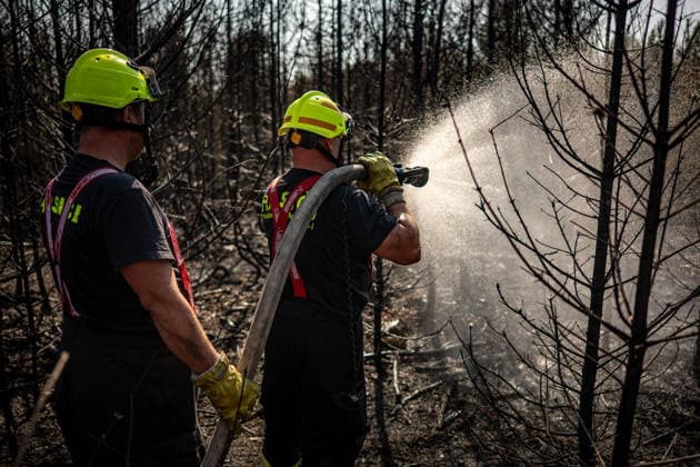 Forest fire extinguishing in the Czech Republic VETRKOVICE, CZECH REPUBLIC - JULY 31: Czech firefighters extinguish a forest and field fire covering an area of ??27 hectares in Vetrkovice (Moravian-Silesian Region), Czech Republic on July 31, 2026. According to a fire department spokesperson, 13 firefighting units are responding. Firefighters are also continuously monitoring the situation using drones, which provide an overview of the fire s development and help manage firefighting efforts. Work will continue into the next night. Lukas Kabon Anadolu Vetrkovice Czech Republic. Editorial use only. Please get in touch for any other usage.  Copyright: x2026xAnadoluxLukasxKabonx