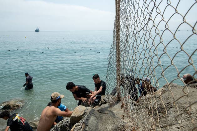 July 31, 2026, Ceuta, Ceuta, Spain: Hundreds of migrants attempt to swim from Morocco to the Spanish city of Ceuta in North Africa. Ceuta Spain  - ZUMAd308 20260731_zsp_d308_068 Copyright: xJuanxCarlosxLucasx