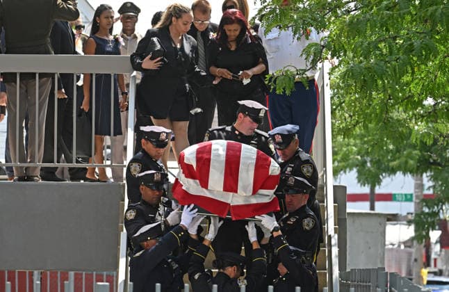 July 31, 2026, New York, New York, USA: July 31, 2026 - New York, NY, USA -The funeral for U.S. Army Staff Sergeant Angel Sarah Rampersad, the 28-year-old Ozone Park soldier killed on July 17, 2026 in Jordan by Iranian missile attack, takes place at the Calvary Assembly of God Church in Ozone Park Queens. The casket seen here with her mother behind it. Her family was joined by many other mourners including Mayor Mamdani and Gov. Hochul. (Andrea RENAULT Zuma Press New York USA  - ZUMAg115 20260731_faf_g115_006 Copyright: xAndreaxRenaultx