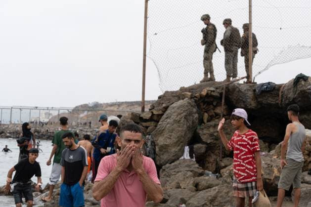 Migrants Cross Into Spain™s Ceuta Enclave From Morocco CEUTA, Spain July 31, 2026: Migrants cross into the Spanish enclave of Ceuta from Morocco as authorities face increased migration pressure at the border. While some migrants continue attempting to enter the enclave, others leave Spain voluntarily amid difficult living conditions and uncertainty over their situation. Ceuta Spain Copyright: x xMarioxMoronx xJNAxPressx
