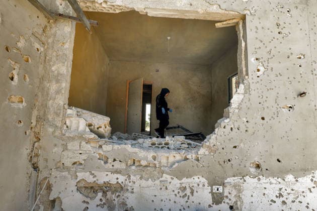 July 31, 2026, Zawtar Al-Gharbieh, Zawtar Al-Gharbieh, Lebanon: Lebanese Ihsan Yaghi, gestures as she stands inside her destroyed and burned house in the southern Lebanese village of Zawatar al-Gharbieh. Civilians started returning slowly the devastated hamlet after the army deployed inside the village following an Israeli withdrawal from several points inside it. Zawtar Al-Gharbieh Lebanon - ZUMAn313 20260731_zip_n313_015 Copyright: xMarwanxNaamanix
