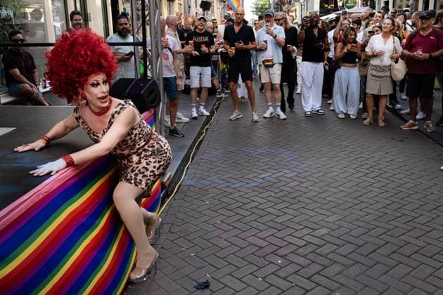 AMSTERDAM - A WorldPride Street Party on the Zeedijk. Because this 30th edition of Pride Amsterdam is also the 10th celebration of World Pride, the event lasts two weeks this year instead of one. As a result, the Canal Parade, the colorful boat parade normally the grand finale of Pride Amsterdam, is taking place halfway through the event this year. RAMON VAN FLYMEN ANP netherlands out - belgium out  Copyright: xx x564650396x originalFilename: 564650396.jpg