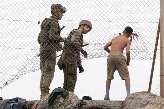 July 31, 2026, Ceuta, Spain: CEUTA, Spain Ã¢â‚¬ July 31, 2026: Migrants cross into the Spanish enclave of Ceuta from Morocco as authorities face increased migration pressure at the border. While some migrants continue attempting to enter the enclave, others leave Spain voluntarily amid difficult living conditions and uncertainty over their situation. Ceuta Spain - ZUMAq101 20260731_zna_q101_090 Copyright: xMarioxMoroÂ³Nx