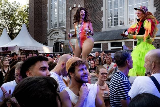 AMSTERDAM - A WorldPride Street Party at the Westerkerk. Because this 30th edition of Pride Amsterdam is also the 10th celebration of World Pride, the event lasts two weeks this year instead of one. As a result, the Canal Parade, the colorful boat parade normally the grand finale of Pride Amsterdam, is taking place halfway through the event this year. RAMON VAN FLYMEN ANP netherlands out - belgium out  Copyright: xx x564650931x originalFilename: 564650931.jpg