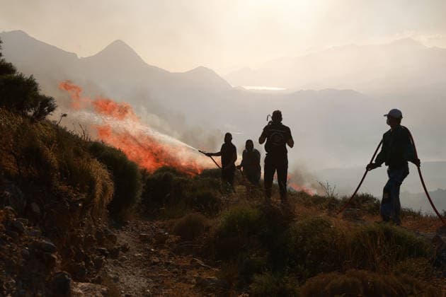 Wildfires continue in Rethymno region of Crete CRETE, GREECE - JULY 31: Firefighters battle a wildfire burning near the village of Drimiskos in the Rethymno region on the island of Crete, Greece, on July 31, 2026. Costas Baltas Anadolu Crete Greece. Editorial use only. Please get in touch for any other usage.  Copyright: x2026xAnadoluxCostasxBaltasx