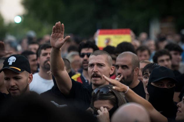 Protest Against the Migration Crisis Outside the Moroccan Embassy in Madrid Several protesters gather outside the Moroccan embassy on July 31, 2026, in Madrid, Spain. The demonstration, organized by Núcleo Nacional, aims to express opposition to the migration crisis that has unfolded in Ceuta over the past few days, during which more than 40,000 migrants entered Spanish territory by swimming across the Alboran Sea. JULY 31, 2026 PROTEST MIGRATION MIGRATION CRISIS MOROCCO MIGRANTS SPANISH FLAG POLICENATIONAL POLICE OFFICERS NÚCLEO NACIONAL RECONQUISTA Diego Radamé Madrid Madrid Spain  Copyright: xDiegoxRadamÃ sx 7697689