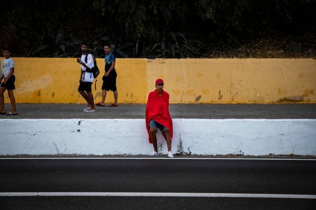 Migrants gather near the Tarajal border crossing in Ceuta CEUTA, SPAIN JULY 31 2026: Migrants gather near the Tarajal border crossing in Ceuta as Spanish security forces monitor the area during the afternoon. Ceuta Spain Copyright: x xSamuelxVegax xJNAxPressx