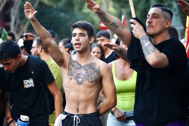 Far-right demonstration outside Moroccan Embassy in Barcelona BARCELONA, SPAIN JULY 31, 2026: Participants attend a demonstration outside the Moroccan Embassy in Barcelona following recent migration developments at Spain s North African enclave of Ceuta. Demonstrators wave Spanish flags, display banners and chant slogans during the protest, while some participants are seen making gestures commonly associated with Nazi salutes. Barcelona Spain Copyright: x xPabloxCarvajalxMunizagax xJNAxPressx