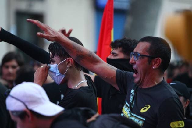 Far-right demonstration outside Moroccan Embassy in Barcelona BARCELONA, SPAIN JULY 31, 2026: Participants attend a demonstration outside the Moroccan Embassy in Barcelona following recent migration developments at Spain s North African enclave of Ceuta. Demonstrators wave Spanish flags, display banners and chant slogans during the protest, while some participants are seen making gestures commonly associated with Nazi salutes. Barcelona Spain Copyright: x xPabloxCarvajalxMunizagax xJNAxPressx