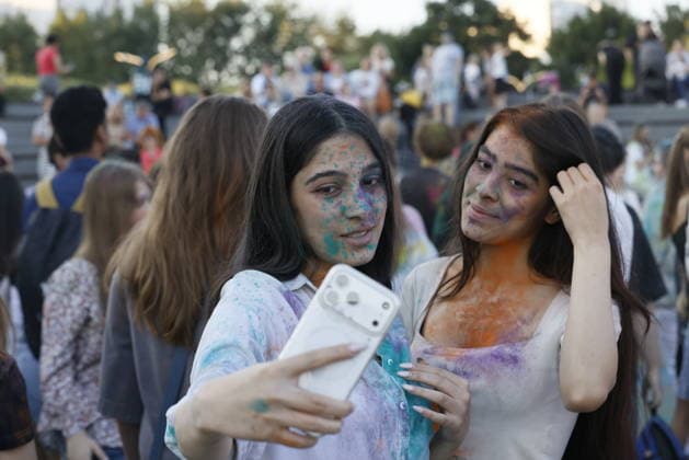 Holi Festival of Colors in Moscow, MOSCOW, RUSSIA - JULY 31: People throw colored powder into the air as they celebrate the Holi Festival of Colors in Moscow, Russia on July 31, 2026. The traditional Indian festival, which symbolizes the arrival of spring and the victory of good over evil, has become a popular entertainment event among locals, drawing thousands of participants who dance to music and cover each other in vibrant powders. Yulia Morozova Anadolu Moscow City Rusya. Editorial use only. Please get in touch for any other usage.  Copyright: x2026xAnadoluxYuliaxMorozovax