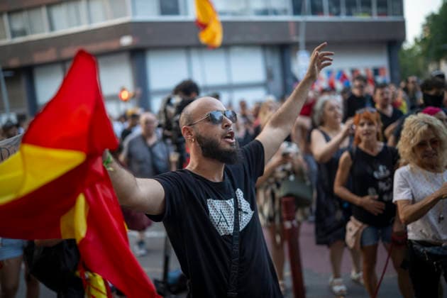 Protest Against the Migration Crisis Outside the Moroccan Consulate in Barcelona Several protesters gathered outside the Moroccan consulate on July 31, 2026, in Barcelona, Catalonia, Spain. The demonstration, organized by Núcleo Nacional, aims to express opposition to the migration crisis that has unfolded in Ceuta over the past few days, when more than 40,000 migrants swam across the Alboran Sea to enter Spanish territory. JULY 31, 2026 MOROCCAN CONSULATE MIGRANTS MIGRATION CRISIS CATALONIA NÚCLEO NACIONAL Lorena Sopê Barcelona Catalonia Barcelona Catalonia Spain  Copyright: xLorenaxSopÃªnax 7697789