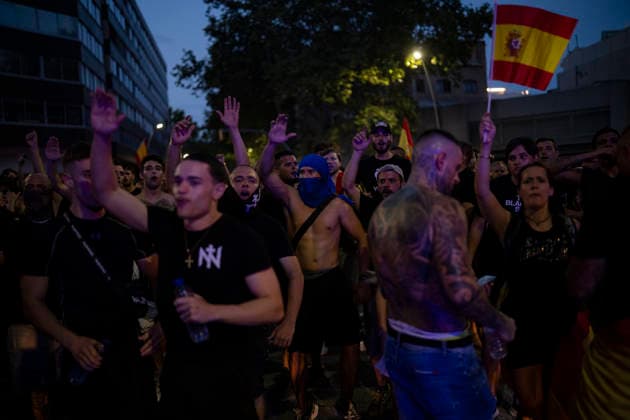 Protest Against the Migration Crisis Outside the Moroccan Consulate in Barcelona Several protesters gathered outside the Moroccan consulate on July 31, 2026, in Barcelona, Catalonia, Spain. The demonstration, organized by Núcleo Nacional, aims to express opposition to the migration crisis that has unfolded in Ceuta over the past few days, when more than 40,000 migrants swam across the Alboran Sea to enter Spanish territory. JULY 31, 2026 MOROCCAN CONSULATE MIGRANTS MIGRATION CRISIS CATALONIA NÚCLEO NACIONAL Lorena Sopê Barcelona Catalonia Barcelona Catalonia Spain  Copyright: xLorenaxSopÃªnax 7697805